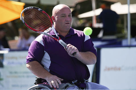 david hitting a backhand volley